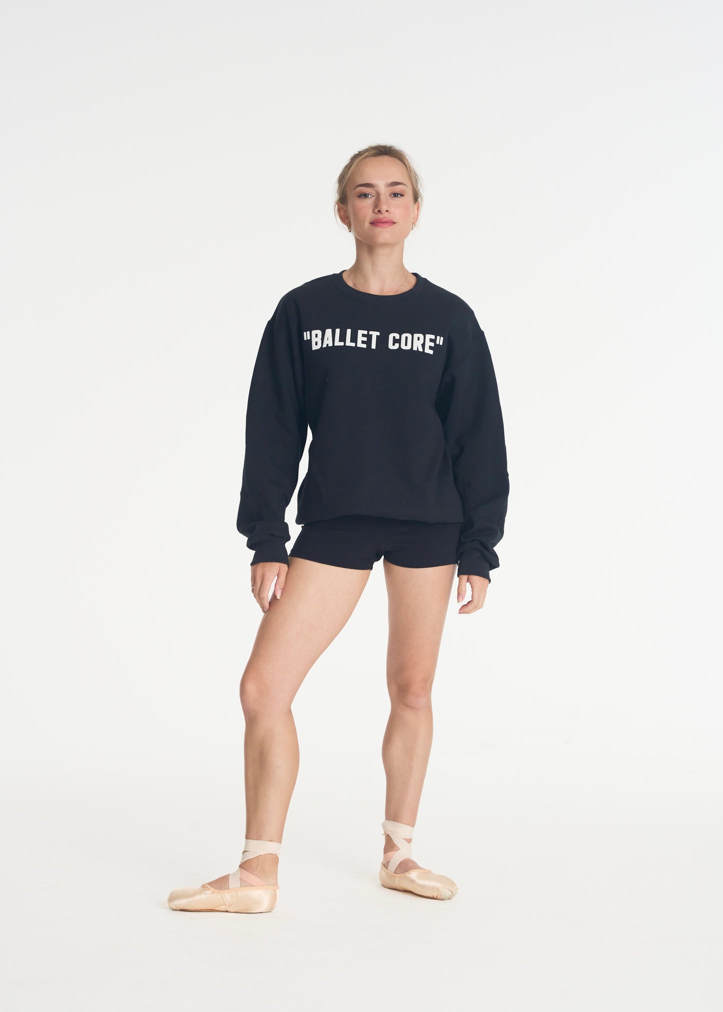 model wearing black ballet core crewneck