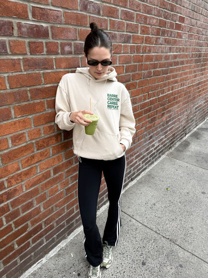 Ava Sautter's BARRE CENTER CARBS REPEAT HOODIE.