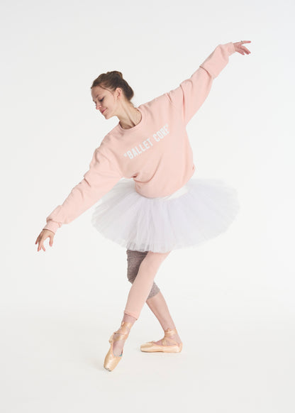 model dancing in pink ballet core crewneck